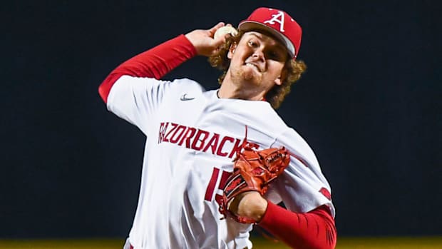 Razorbacks' Ben McLaughlin on mound shutting down Omaha in win Tuesday night.